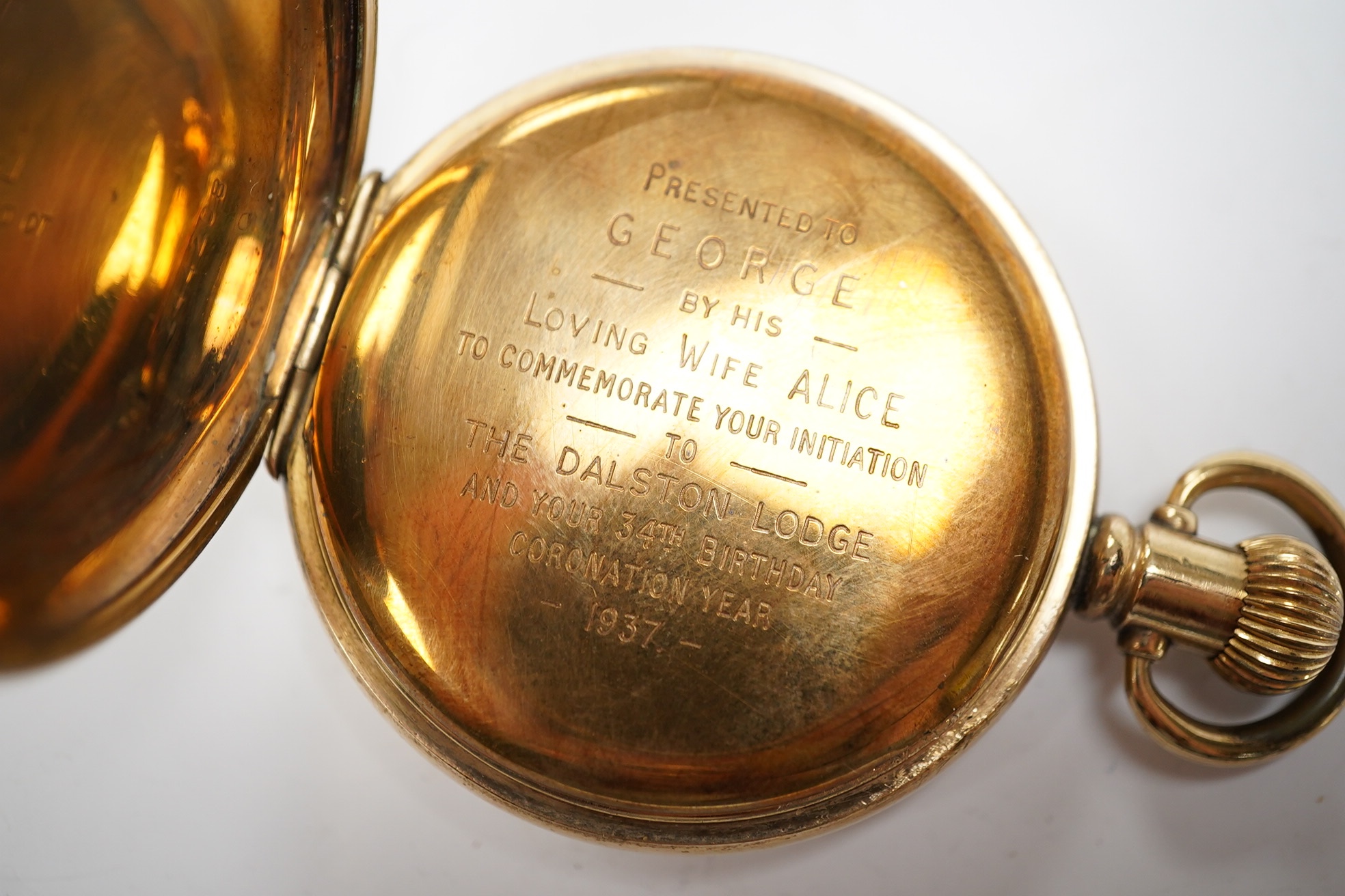 A gold plated Vertex hunter pocket watch and a George V silver mounted glass desk timepiece, with pig finial, height 95mm. Condition - poor.